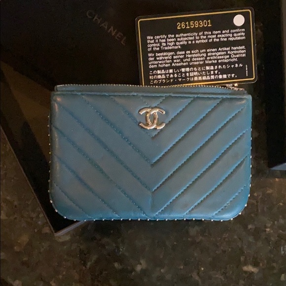 CHANEL Handbags - Chanel teal stud zippy wallet